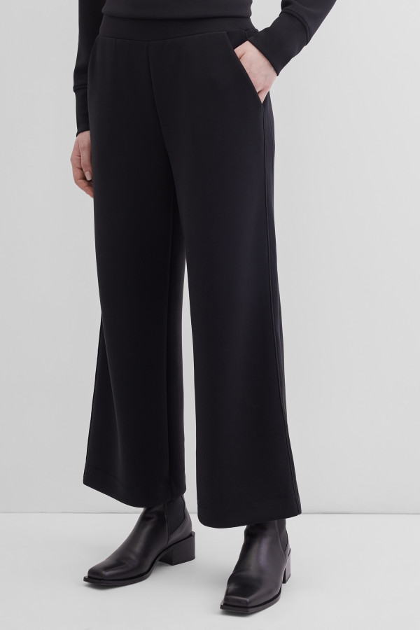 Брюки-клеш от колена