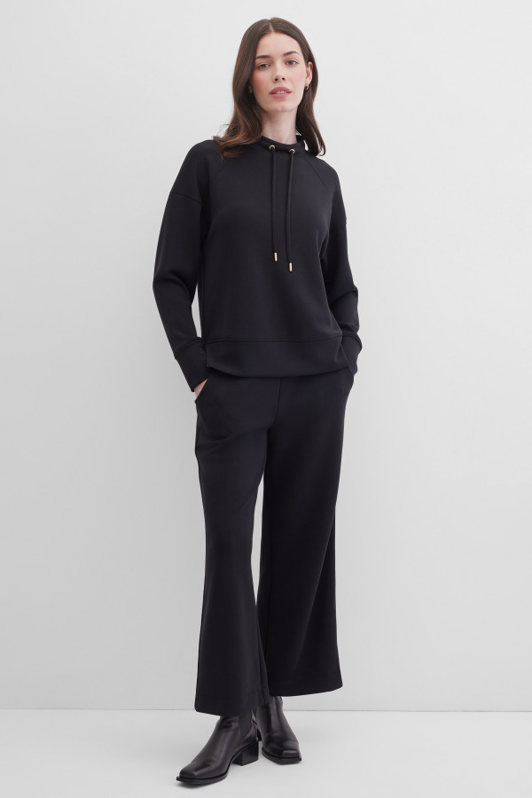 Брюки-клеш от колена