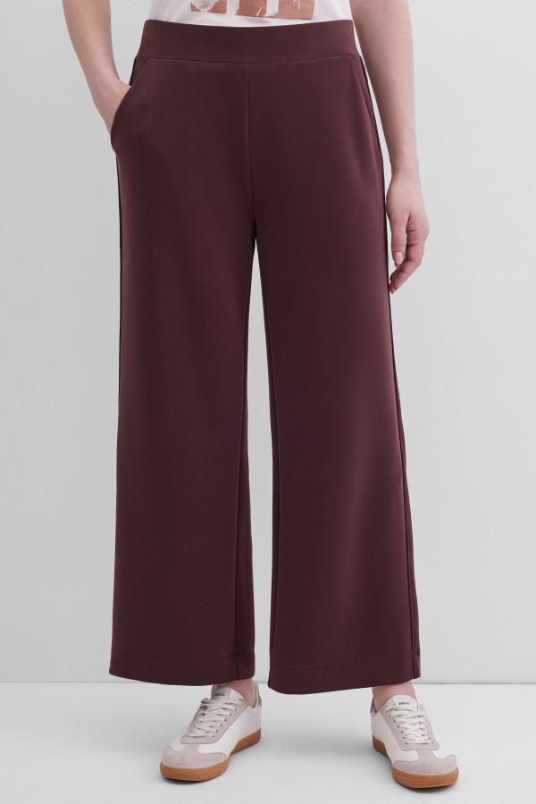 Брюки-клеш от колена