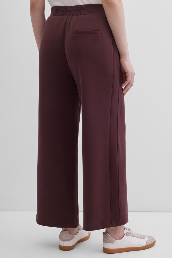 Брюки-клеш от колена