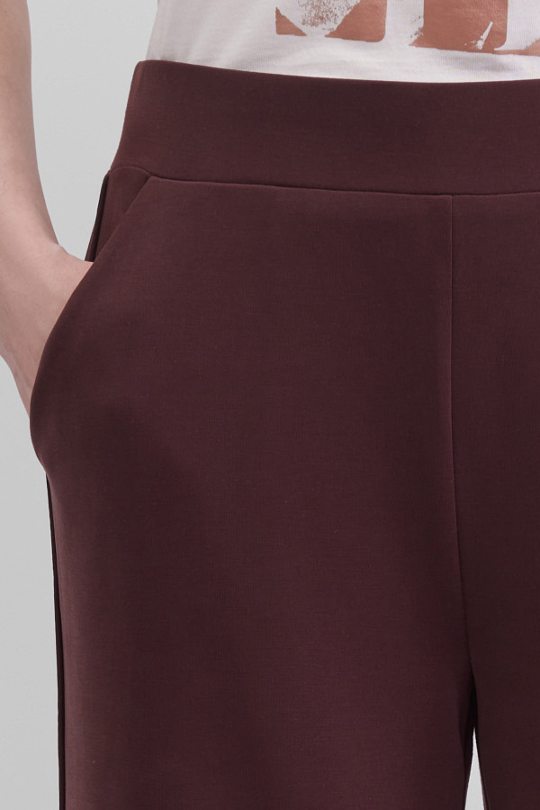 Брюки-клеш от колена