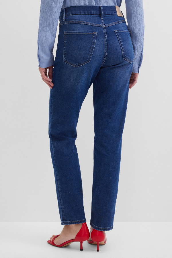 Джинсы зауженные с эффектом потертости