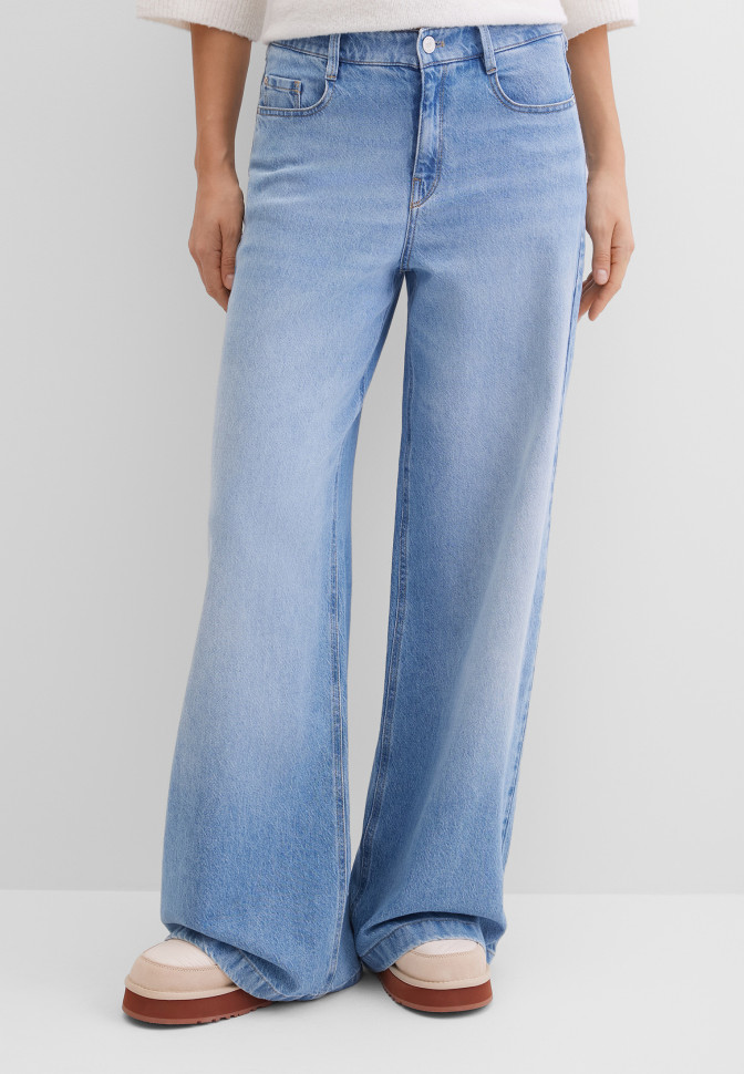 Джинсы клеш широкие