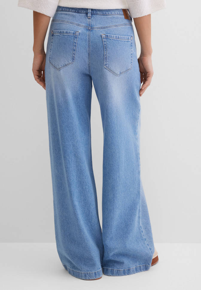 Джинсы клеш широкие