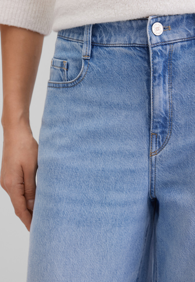 Джинсы клеш широкие