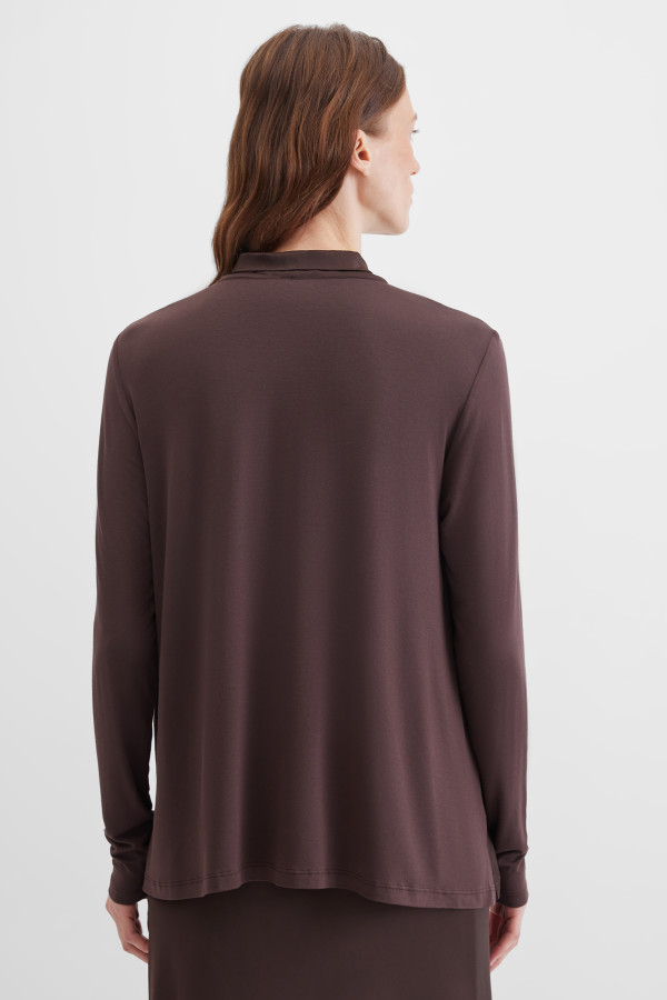 Блузка с бантом