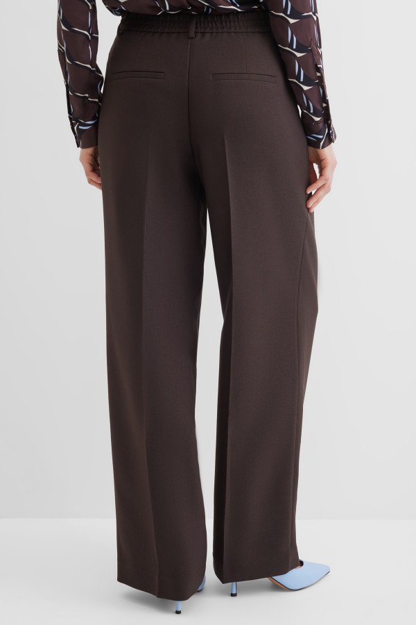 Брюки широкие с защипами