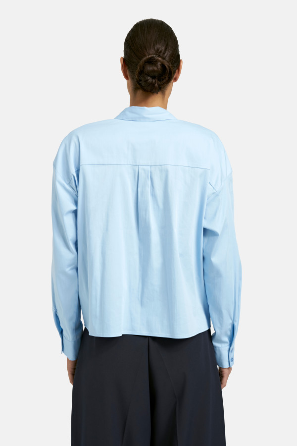 Блузка с накладными карманами